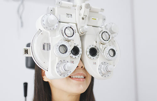 Woman having eye test